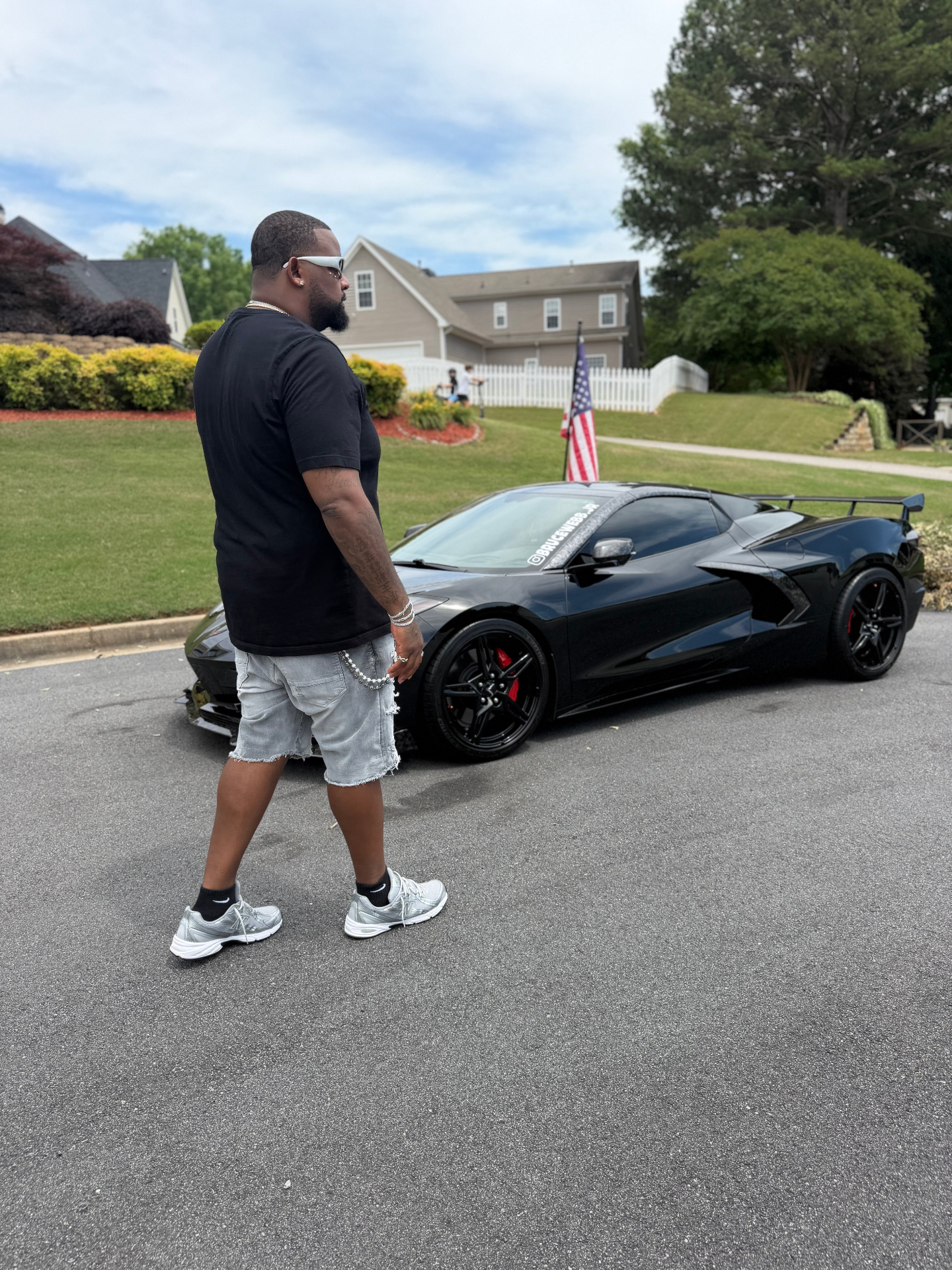 Bruce Webb in the driver seat of his Corvette